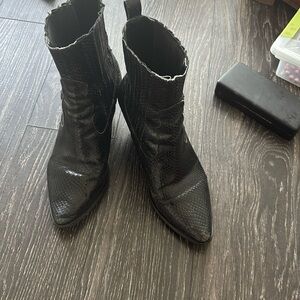 Black ‘cowboy’ booties with 2 1/2 inch heel. Very comfy!